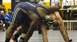 Damon Sims, left, tries to hold down Luke Fleck at 285 lbs.