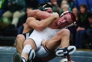 Central Dauphin's Garrett Peppelman controls Cumberland Valley's TC Warner in their 170 lb. bout during the Eagles 36-23 win in their dual match at Central Dauphin. 01/09/2014 Sean Simmers | ssimmers@pennlive.com