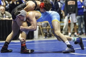 Day 1 quarterfinals of the 2014 District 3-AAA individual wrestling tournament takes place at Hersheypark Arena. At 145 pounds, Cumberland Valley's Felix Belga, left, is defeated by Cedar Cliff's Max Good. 02/21/2014 Dan Gleiter | dgleiter@pennlive.com